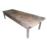 LARGE ANTIQUE PINE ESTATE KITCHEN TABLE the rectangular top, above a conforming frieze, raised on