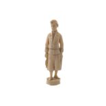 EIGHTEENTH-CENTURY IVORY NEEDLE CASE in the form of a gentleman carrying fish in one hand, the upper