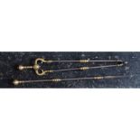 ﻿TWO GEORGIAN BRASS AND STEEL FIRE IRONS Direct all shipping enquiries to shipping@sheppards.ie 72