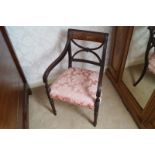 REGENCY PERIOD MAHOGANY AND SATINWOOD INLAID LIBRARY CHAIR the panelled reeded and scrolled back,