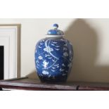 LARGE CHINESE QING PERIOD BLUE AND WHITE GINGER JAR AND COVER of baluster form with floral