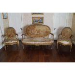 EIGHTEENTH-CENTURY LOUIS XVI CARVED GILTWOOD SALON SUITE each with a ribbon and floral carved crest,