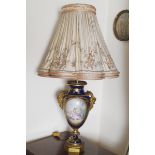 NINETEENTH-CENTURY ORMOLU MOUNTED Sèvres VASE STEMMED TABLE LAMP with oval painted cartouche