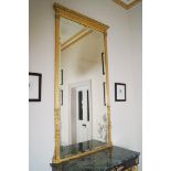 LARGE PAIR OF NINETEENTH-CENTURY GILT FRAMED PIER MIRRORS each with a rectangular bevelled plate,