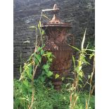 ﻿MONUMENTAL PAIR OF TERRACOTTA URNS AND COVERS ﻿draped with vine leaves and entwined C-scroll