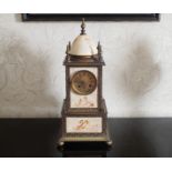 NINETEENTH-CENTURY CONTINENTAL BRASS AND PORCELAIN PANELLED MANTEL CLOCK the brass dial below a