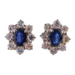 ﻿PAIR OF OVAL SAPPHIRE AND DIAMOND EARRINGS ﻿set in 18 ct. white gold Direct all shipping