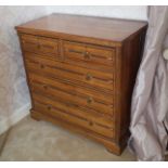 NINETEENTH-CENTURY AESTHETIC REVIVAL PINE CHEST of two short and three long drawers, furnished