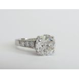 3.08 CT., I COLOUR, SI1 CLARITY, GIA CERTED DIAMOND RING in a platinum and diamond mount Direct