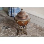 REGENCY PERIOD COPPER AND SILVER PLATED CRESTED TEA-URN with silver armorial crest, London, circa