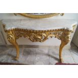 NINETEENTH-CENTURY CARVED GILTWOOD AND GESSO CONSOLE TABLE the marble top with serpentine front,