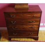 GEORGE III PERIOD MAHOGANY BOXWOOD INLAID CHEST of four long drawers, furnished with brass swag