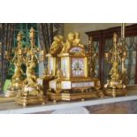 NINETEENTH-CENTURY FRENCH ORMOLU AND PARIS PORCELAIN CLOCK GARNITURE Maker: Japy Feres, Paris, the