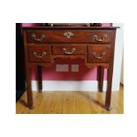 EIGHTEENTH-CENTURY PERIOD MAHOGANY CHIPPENDALE LOWBOY the rectangular cross banded top with