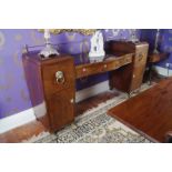 ﻿REGENCY PERIOD MAHOGANY, EBONY INLAID AND SATINWOOD BANDED PEDESTAL SIDEBOARD ﻿furnished with
