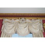 PAIR OF NINETEENTH-CENTURY PARCEL GILTWOOD AND GESSO CURTAIN PELMETS each decorated with a series of