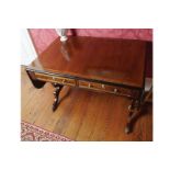 ﻿IRISH REGENCY PERIOD MAHOGANY, BRASS INLAID AND ROSEWOOD CROSSBANDED SOFA-TABLE, CIRCA 1820 ﻿the