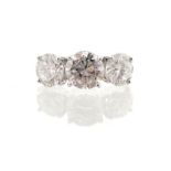 ﻿THREE STONE DIAMOND RING ﻿consisting of a central 1.99 ct. HVVS and two diamonds of 1.50 ct. HVVS