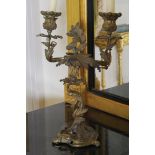 PAIR OF NINETEENTH-CENTURY ORMOLU ROCOCO CANDELABRAS each of two-scroll arms, raised on a leaf