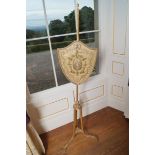 ﻿GEORGE III PERIOD HEPPLEWHITE POLE SCREEN ﻿the shield shaped screen with embroidered silk panel,