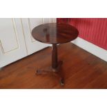 WILLIAM IV PERIOD ROSEWOOD OCCASIONAL TABLE the circular top, raised on a turned chamfered stem