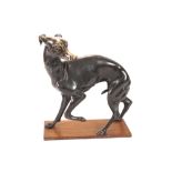 Bronze sculpture of a whippet  mounted on a mahogany base Worldwide shipping available: shipping@