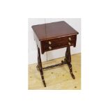 Regency period mahogany side table the rectangular moulded edged top, above a series of two