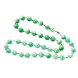 Late nineteenth/early twentieth century Chinese jade necklace of thirty nine beads Worldwide