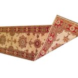 Handmade North West Persian runner on ivory ground, with red border Worldwide shipping available: