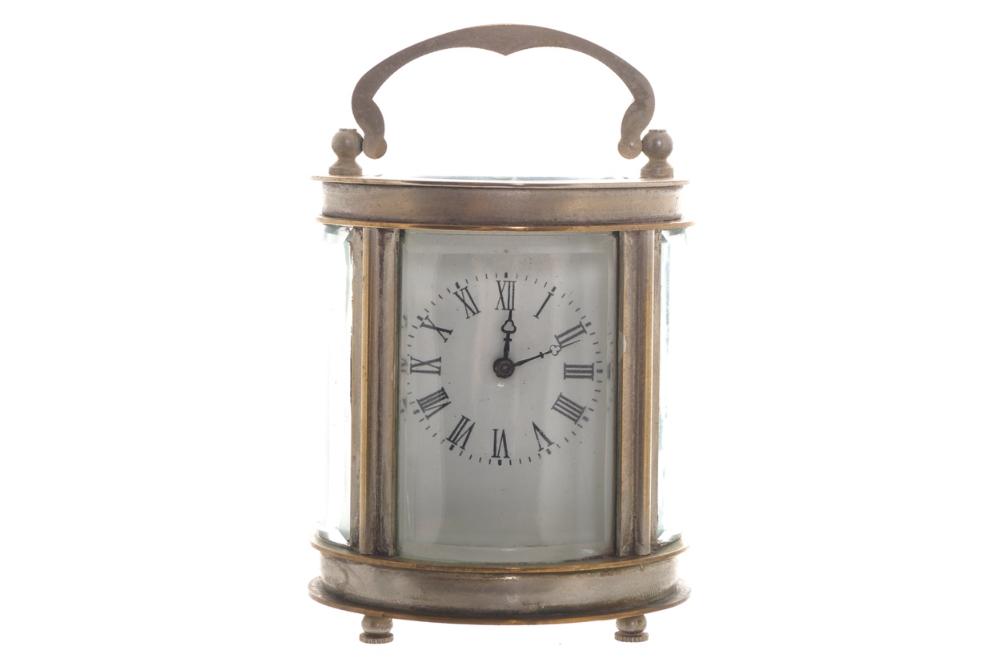Miniature silver plated carriage clock Worldwide shipping available: shipping@sheppards.ie 10 cm.