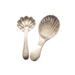 Two silver caddy spoons each with a scallop shaped bowl Worldwide shipping available: shipping@