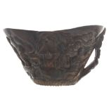 Chinese Qing period carved horn libation cup depicting figures, trees and temples Worldwide shipping