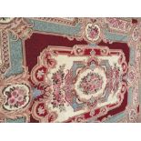 Handmade Aubusson, France carpet, circa 1950 with hand sewn backing, central medallion surrounded by