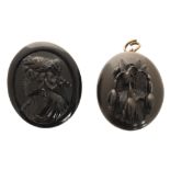 Carved black bakelite cameo mourning brooch and black vulcanite locket Worldwide shipping available: