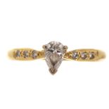 18 ct. yellow gold solitaire diamond ring with smaller diamonds to the shoulder Worldwide shipping