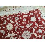 Handmade Ziegler carpet on red ground, with all over pattern and ivory border Worldwide shipping