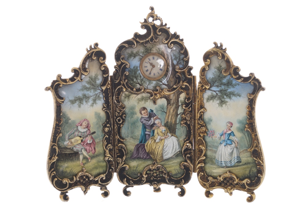 Enamelled and gilded brass three-fold screen with painted panels depicting figures in a landscape,