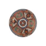 Large Japanese Imari charger the central floral panel circled by alternating panels of mythical