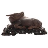 Large Chinese Qing period hardwood buffalo resting on a profusely carved base Worldwide shipping