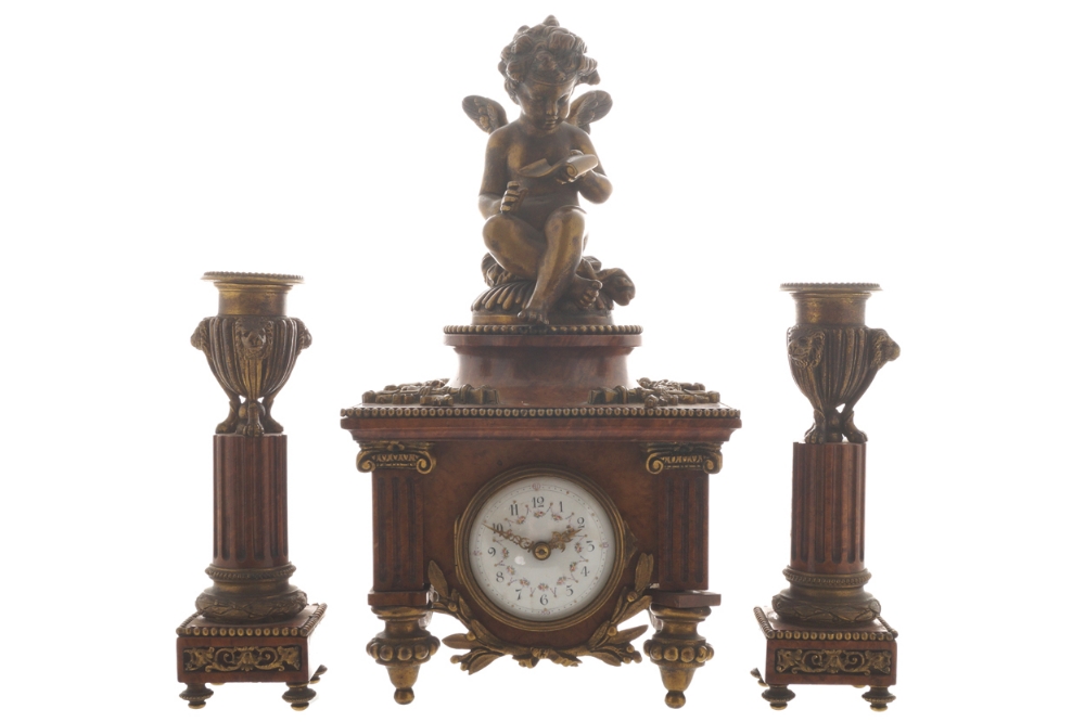 Nineteenth-century ormolu mounted burr walnut clock garniture the enamelled dial with painted floral