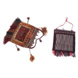 Lot of two Persian rugs and two saddle bags, circa 1900 Worldwide shipping available: shipping@