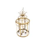 Large Edwardian brass hall lantern of cylindrical form, with curved glazed panels and egg and dart