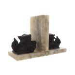 Pair of book rests each with a Chinese fo dog, mounted on marble base Worldwide shipping