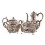 Irish four-piece silver tea and coffee service each of Rococo baluster form, with embossed chaised