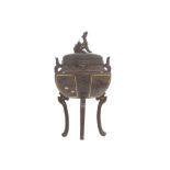 Nineteenth-century Japanese bronze and gold inlaid Koro raised on scroll legs, surmounted by a