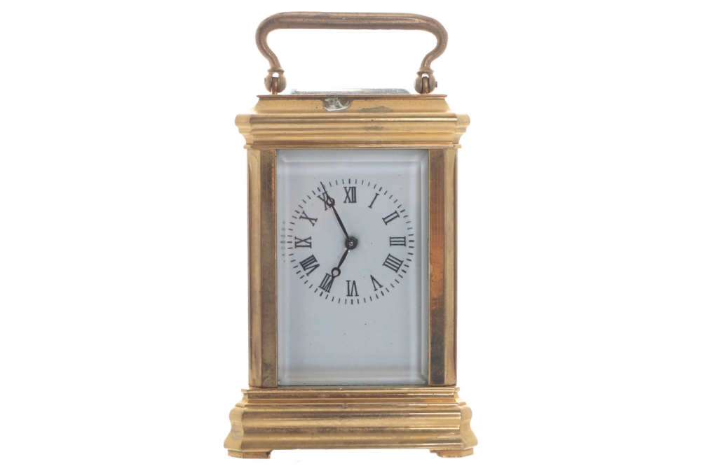 Miniature brass carriage clock of square form Worldwide shipping available: shipping@sheppards.ie