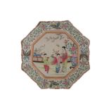 Chinese Qing period famille rose polychrome charger of octagonal form, the central cartouche