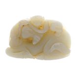 Chinese celadon jade carving depicting a monkey resting on a recumbent horse Worldwide shipping