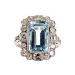 18 ct. white gold diamond and aquamarine ring centre stone of 4.05 ct. surrounded by diamonds of 1.