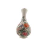 Chinese Qing period famille rose bottle shaped vase decorated with birds amongst blossoms, mark of
